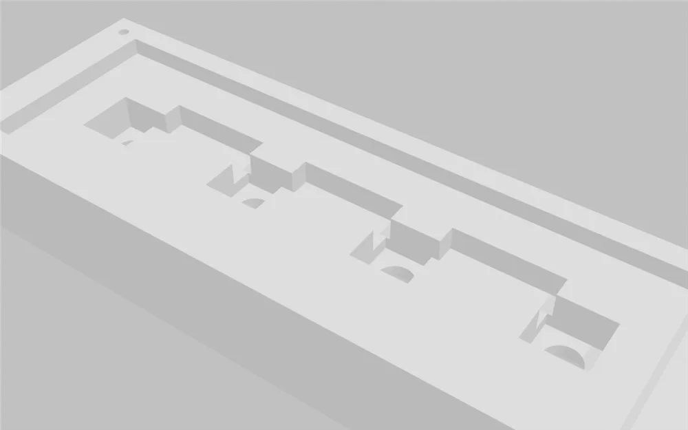Underside of the top plate - wiring channels cut between the switch pockets