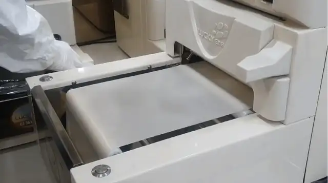 An animated recording of the kimbap machine in operation