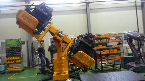 An animation of the two-seat robot arm motion simulator moving with riders on board