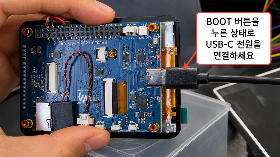 Connecting the USB-C cable while holding the BOOT button